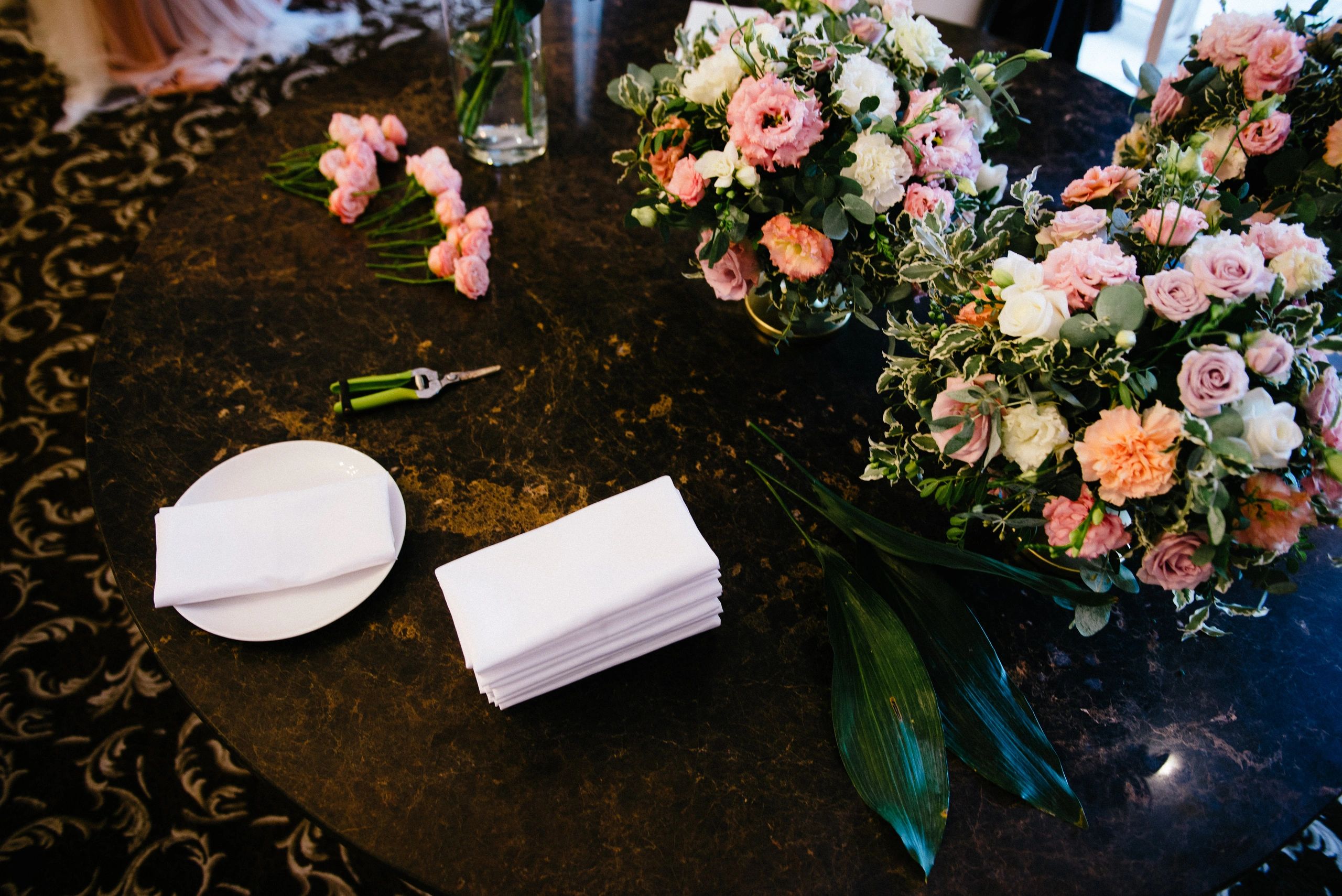 Florist workspace with fresh flowers and bouquet-making details